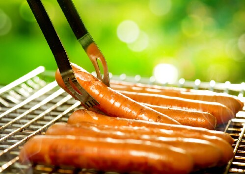 7. Poach your sausages before you grill them.