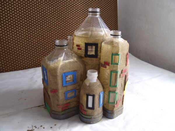 Creating paper roofs.