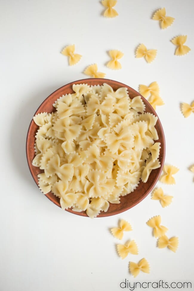 Bow tie pasta ready to be mixed.