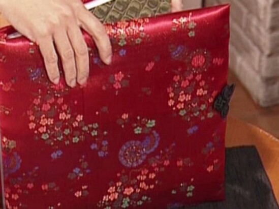 Baby Photo Album Cover - 20 Adorably Creative Upcycling Projects To Repurpose Old Baby Clothes