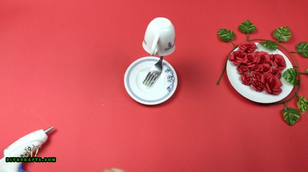 Gluing the fork to saucer.