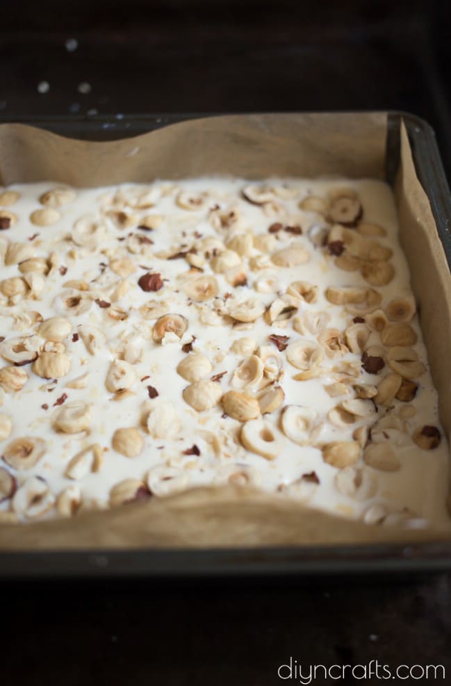 Adding chopped hazelnuts.