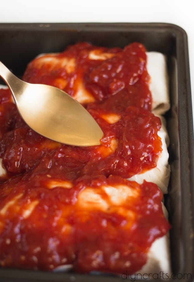 Baking the burritos.