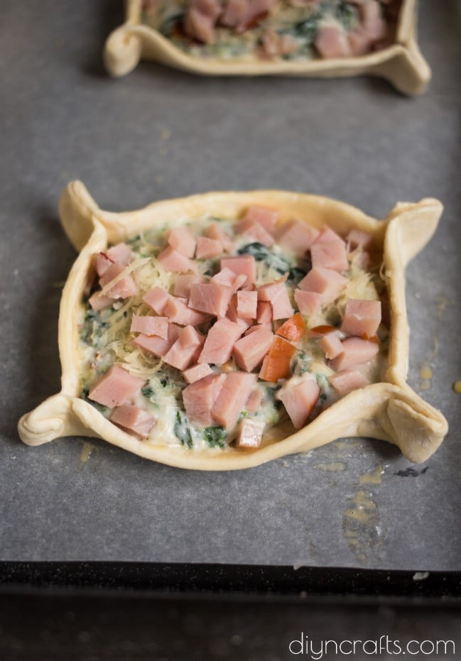 Folding the edges before cooking.