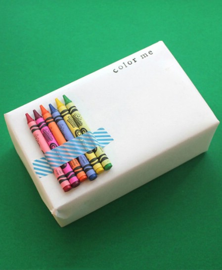 Wrap children’s presents with crayons and white paper.