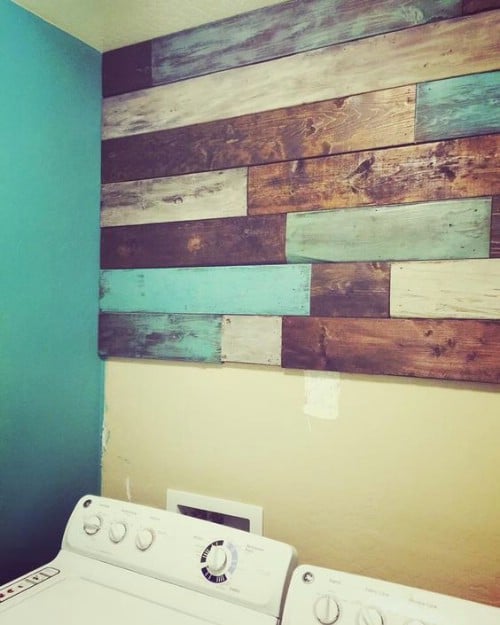 Paint some sections of wood in teal and leave others bare.