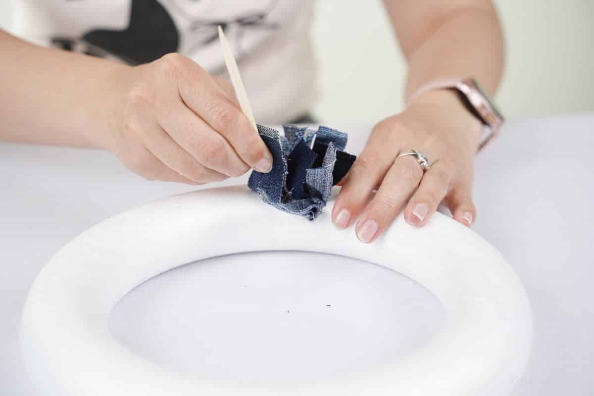 Prepping Denim Strips for Wreath Various denim strips cut and ready for wreath making