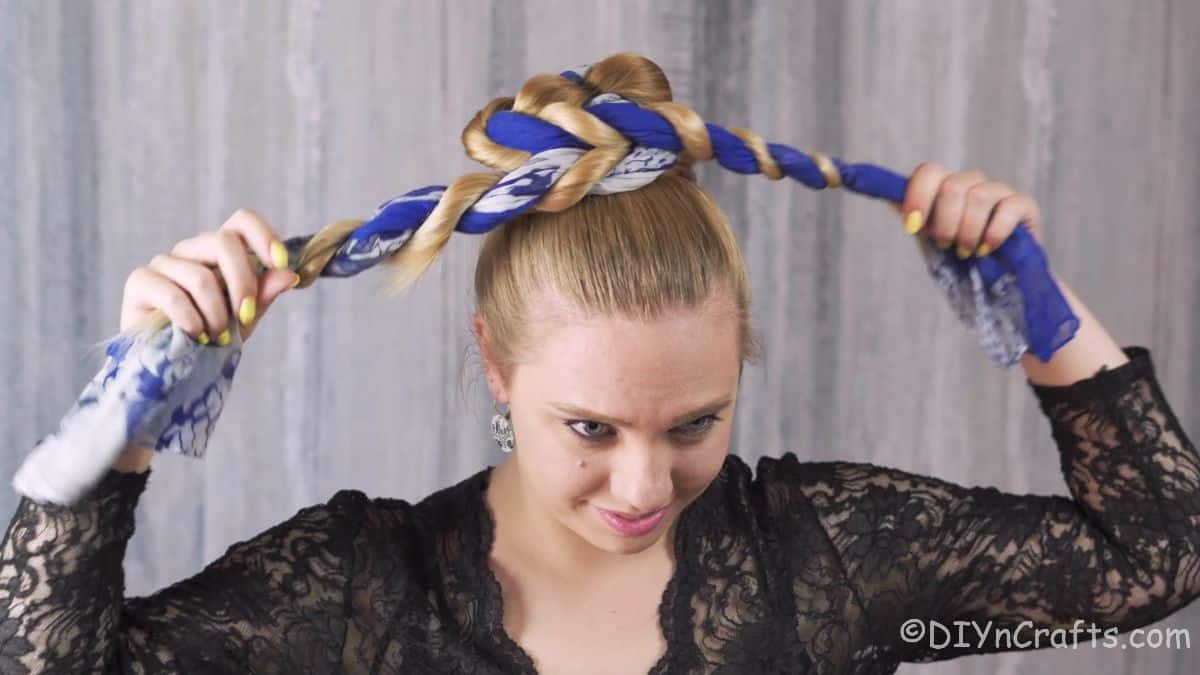 securing hair at bottom of scarf